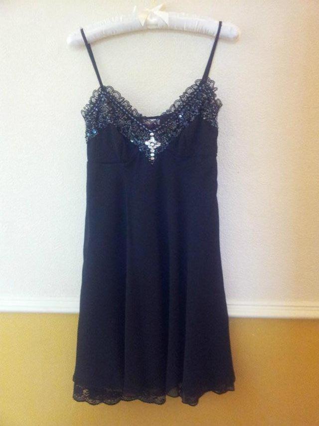 Preview of the first image of Ladies party dress black/jewelled by Lipsy size: s/m.
