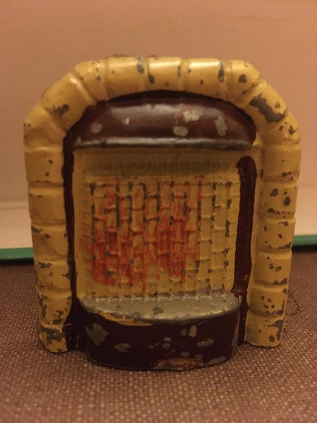 Preview of the first image of Dolls house metal fireplace.