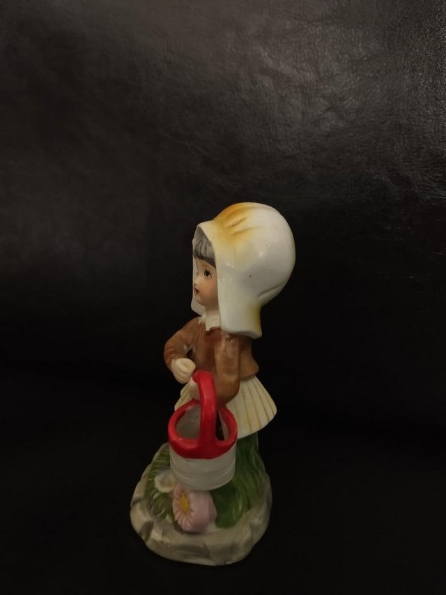Image 4 of Porcelain Figurine Girl with Yellow Bonnet + bucket/pail.
