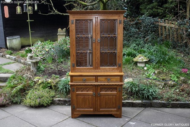 Preview of the first image of AN OLD CHARM VINTAGE OAK DISPLAY CABINET DRESSER SIDEBOARD.