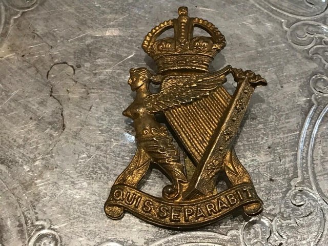 Preview of the first image of Royal Irish Rifles 1ww cap badge original issued.