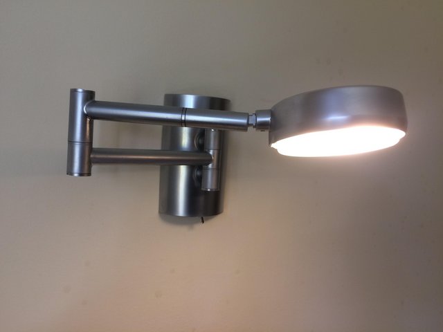 Preview of the first image of A PAIR of adjustable WALL LIGHTS.