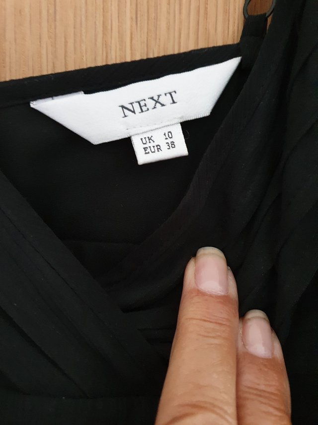 Preview of the first image of LADIES BLACK TOP AND TROUSERS SIZE 10.