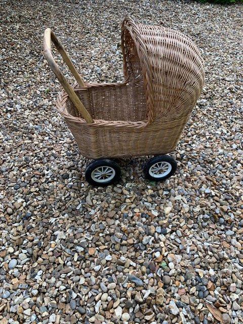 Preview of the first image of Vintage Wicker Dolls Pram.