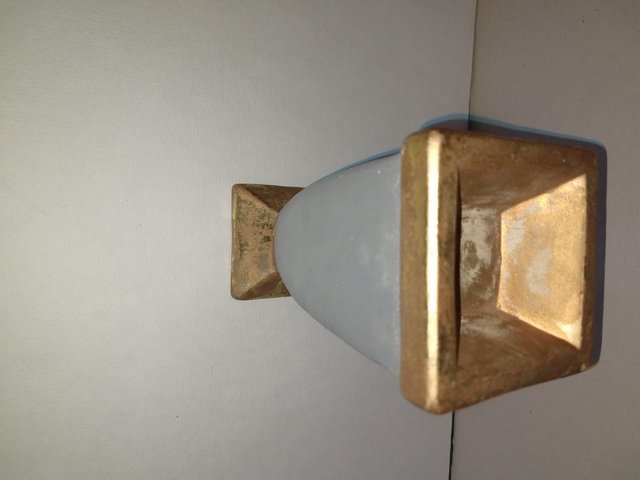 Preview of the first image of Gold and grey antique style pottery candle / tealight holder.