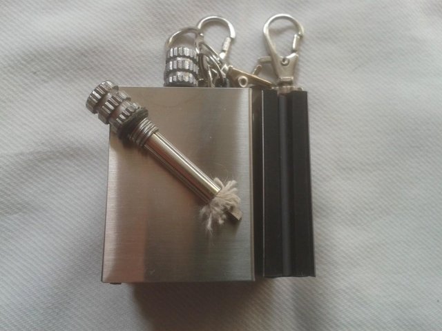 Preview of the first image of New flask petrol flint Lighter, striker, windproof match.