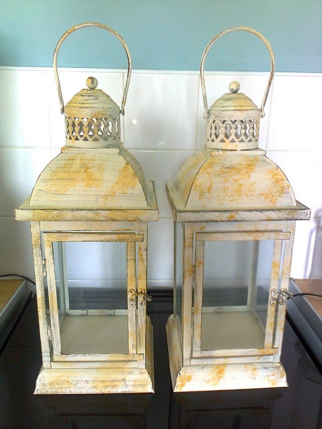 Preview of the first image of Lanterns, 2 Matching Lanterns,1'9 high, 7inch's square,.