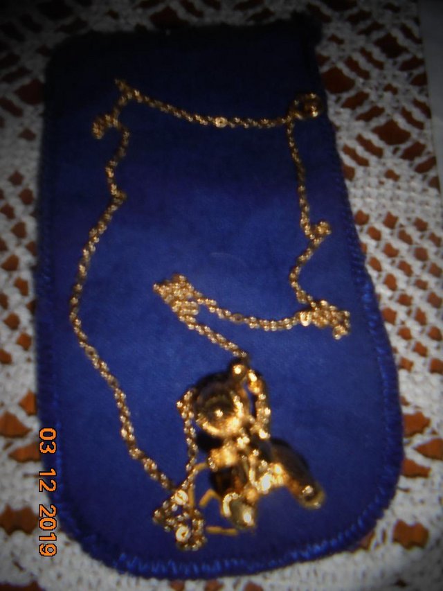 Preview of the first image of FRANKLIN MINT 24K TEDDY BEAR NECKLACE 1978.