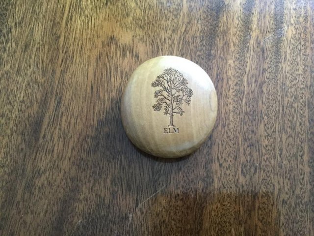 Preview of the first image of Carved elm wooden ornament - original.