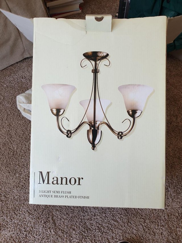 Preview of the first image of Manor 3 light semi flush antique brass plated fitting.