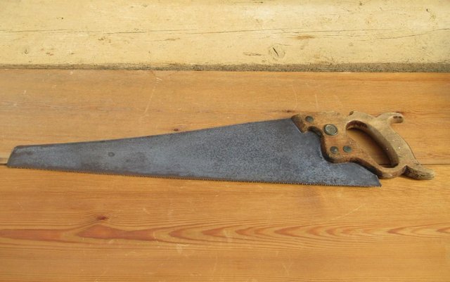 Preview of the first image of Carpenters Hand Saw 22” Warranted Superior – Vintage.