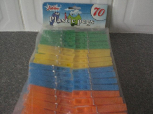 Image 2 of 70 Plastic pegs (Brand new packet)
