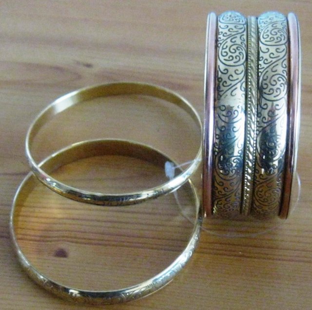 Preview of the first image of Bangles/bracelets, both sets NEW £3 each..