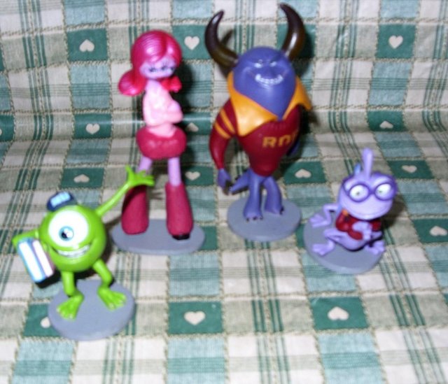 Preview of the first image of Monster Inc x4 plastic figures, cake toppers,gift.
