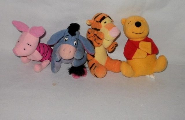 Preview of the first image of McDonalds toys Winnie the Pooh collection.