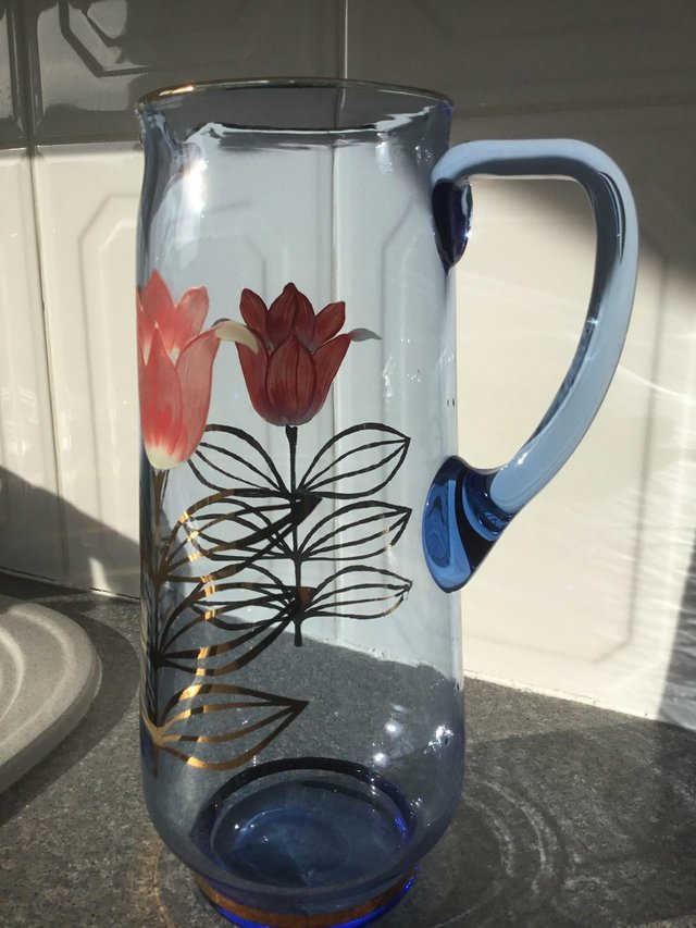 Image 2 of Attractive Blue Tint Glass Jug with two flowers