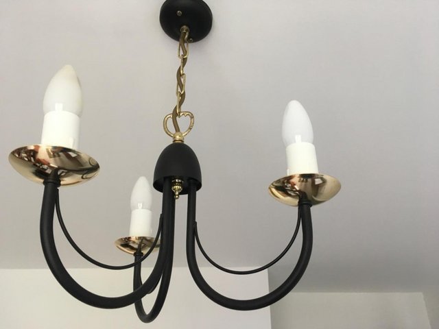 Preview of the first image of A choice of three modern metal pendant light fittings.