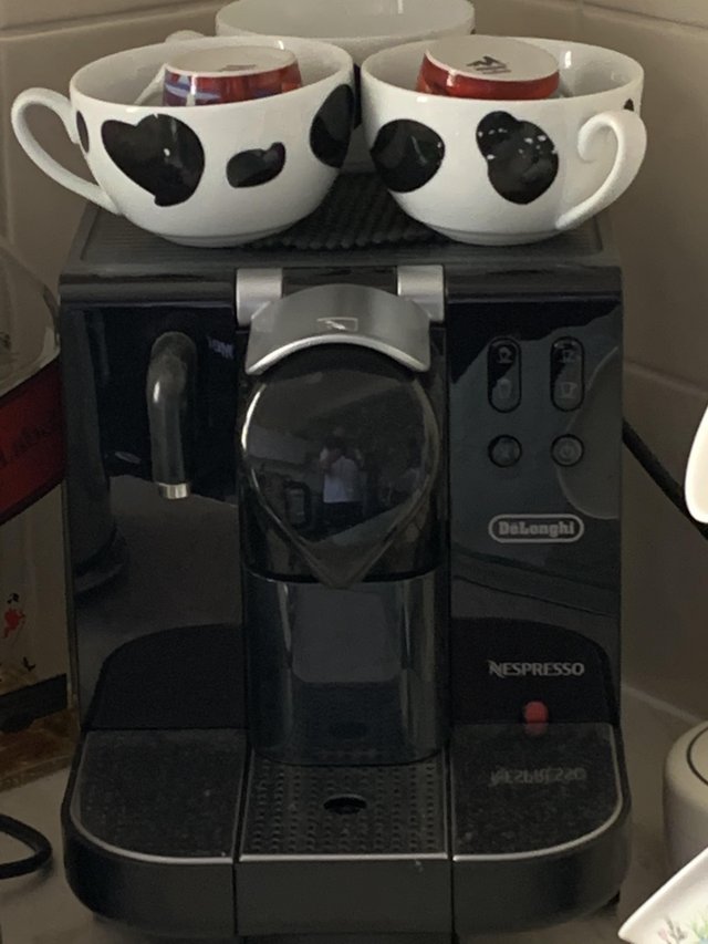 Preview of the first image of DeLonghi Nespresso coffee machine.