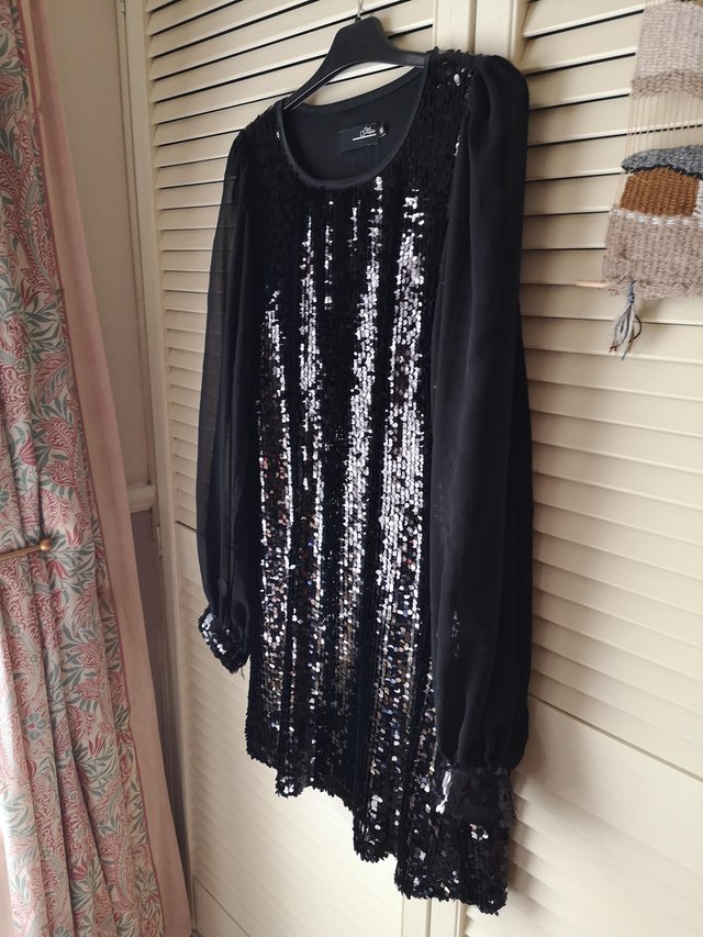 Preview of the first image of Size 16 black sequined dress.