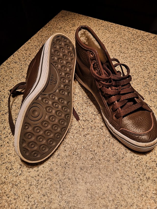 Preview of the first image of Adidas fur lined brown leather sneaker size 5.