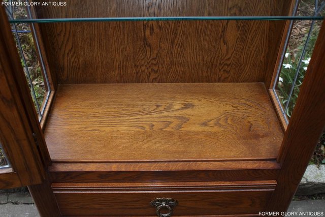 Image 28 of AN OLD CHARM MINUET LIGHT OAK CHINA DISPLAY CABINET STAND