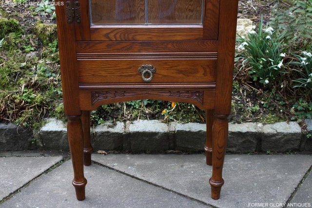 Image 34 of AN OLD CHARM MINUET LIGHT OAK CHINA DISPLAY CABINET STAND