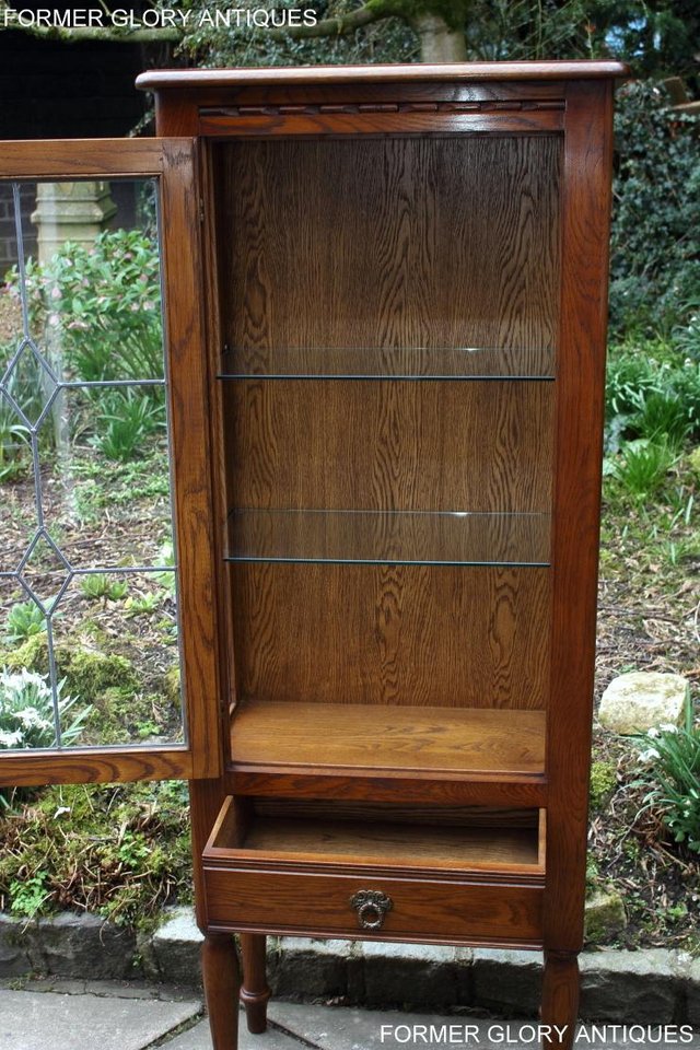Image 37 of AN OLD CHARM MINUET LIGHT OAK CHINA DISPLAY CABINET STAND