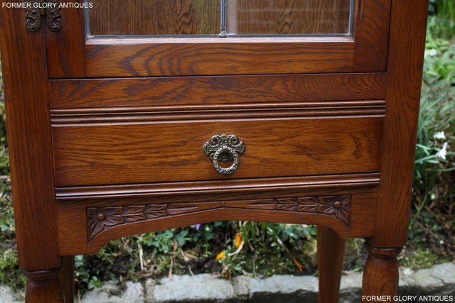 Image 40 of AN OLD CHARM MINUET LIGHT OAK CHINA DISPLAY CABINET STAND