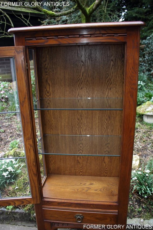 Image 42 of AN OLD CHARM MINUET LIGHT OAK CHINA DISPLAY CABINET STAND