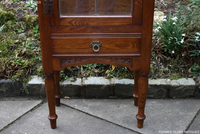 Image 52 of AN OLD CHARM MINUET LIGHT OAK CHINA DISPLAY CABINET STAND