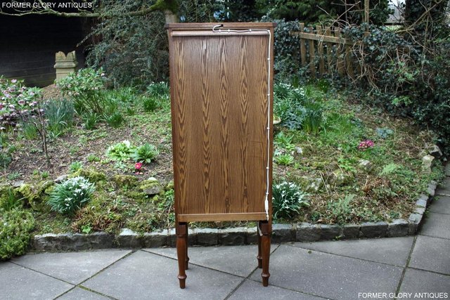 Image 54 of AN OLD CHARM MINUET LIGHT OAK CHINA DISPLAY CABINET STAND