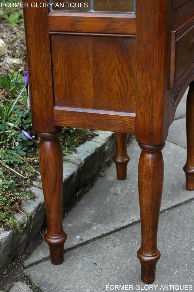 Image 63 of AN OLD CHARM MINUET LIGHT OAK CHINA DISPLAY CABINET STAND