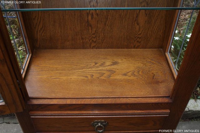 Image 86 of AN OLD CHARM MINUET LIGHT OAK CHINA DISPLAY CABINET STAND