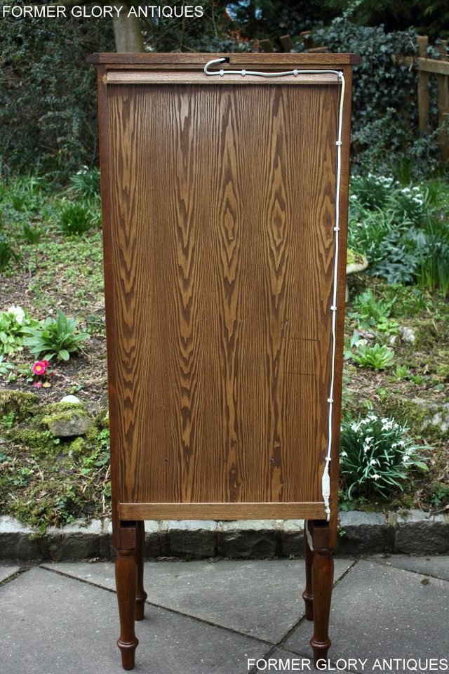 Image 103 of AN OLD CHARM MINUET LIGHT OAK CHINA DISPLAY CABINET STAND