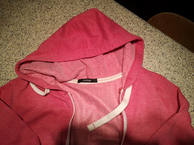 Preview of the first image of Size 12 dark pink George hooded sweatshirt.
