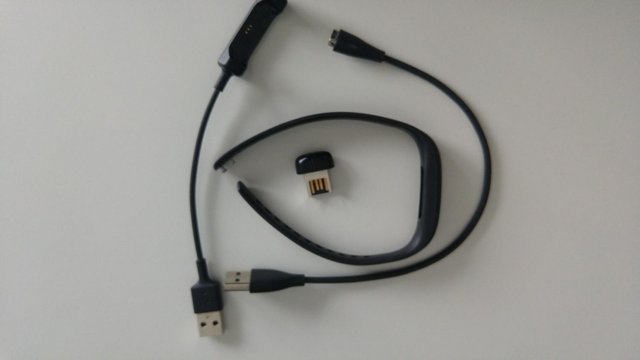 Preview of the first image of OEM Fitbit FB150 Sync USB Wireless Dongle Receiver, charger.