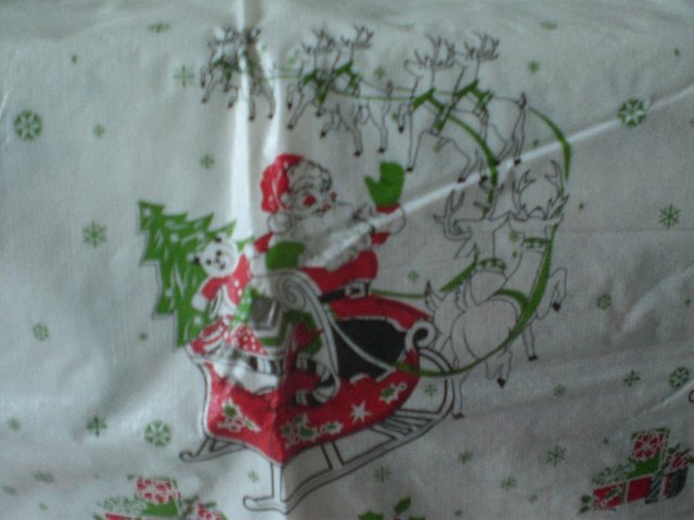Preview of the first image of Christmas– Flannel back Vinyl Table Cloth (New).