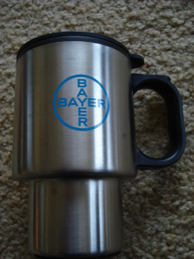 Preview of the first image of NEW THERMAL TRAVEL MUG WITH HANDLE, IDEAL FOR CUPHOLDERS.