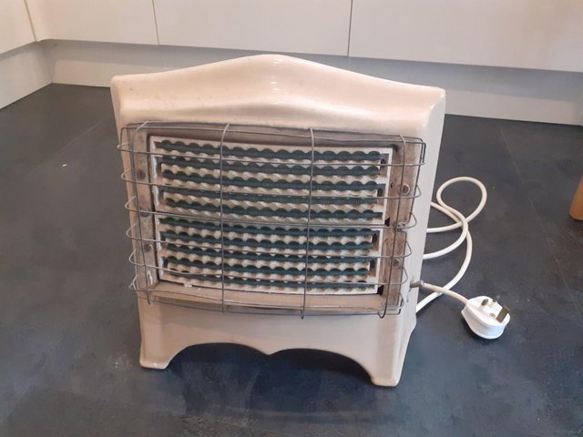 Preview of the first image of Cast iron electric fire 240voltAC.