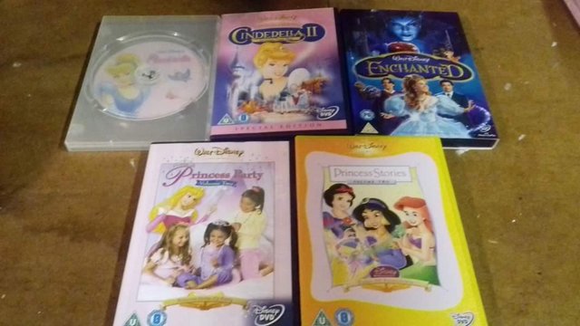 Preview of the first image of Disney & Barbie DVDs, cds books toys.