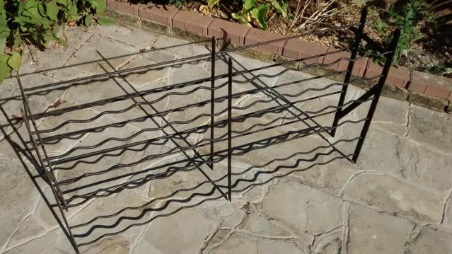 Preview of the first image of Victorian wrought iron wine rack.
