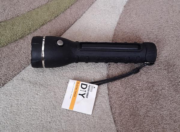 Preview of the first image of Tesco Black Rubber Torch      BX25.