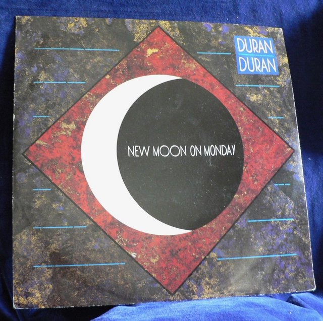 Preview of the first image of Duran Duran - New Moon On Monday 12" single.