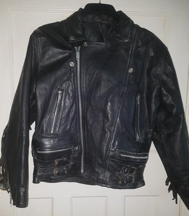 Preview of the first image of Black Leather Motorcycle Jacket Size S.
