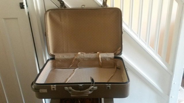 Preview of the first image of St Michaels wheeled suitcase with keys.