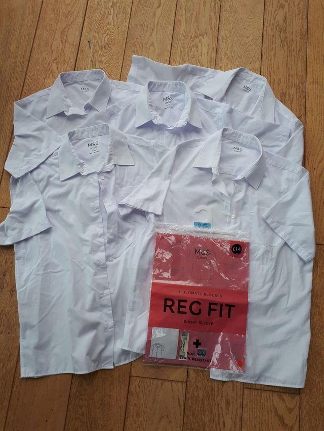 Preview of the first image of 5 x Age 15-16 M&S Non Iron Girls short sleeve school shirts.