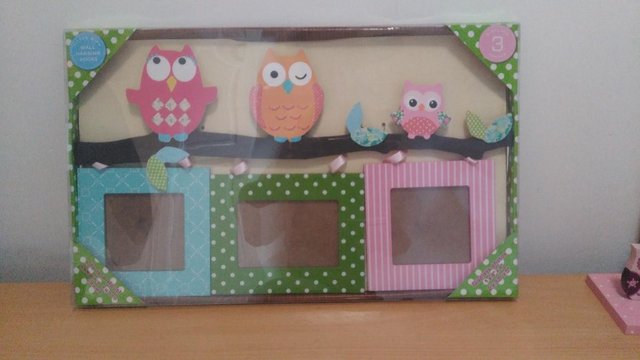 Preview of the first image of Hanging owl photo frame.