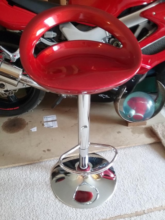 Preview of the first image of Chrome and Red gas adjustable Bar/Kitchen stool.