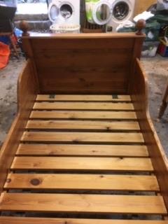 Preview of the first image of Antique wooden single sleigh bed.
