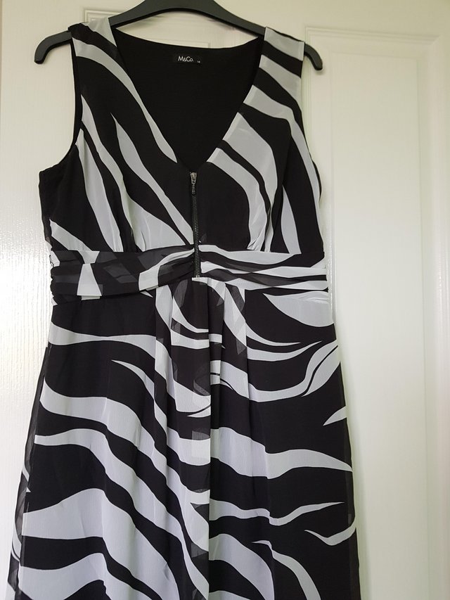 Preview of the first image of M & Co Size 14 Ladies Black And White Floor Length Dress.